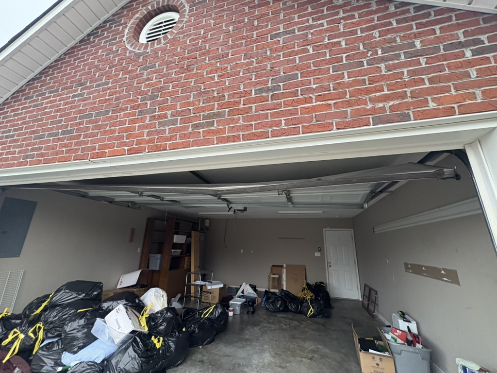 Quick garage door swap out after hit by a car!